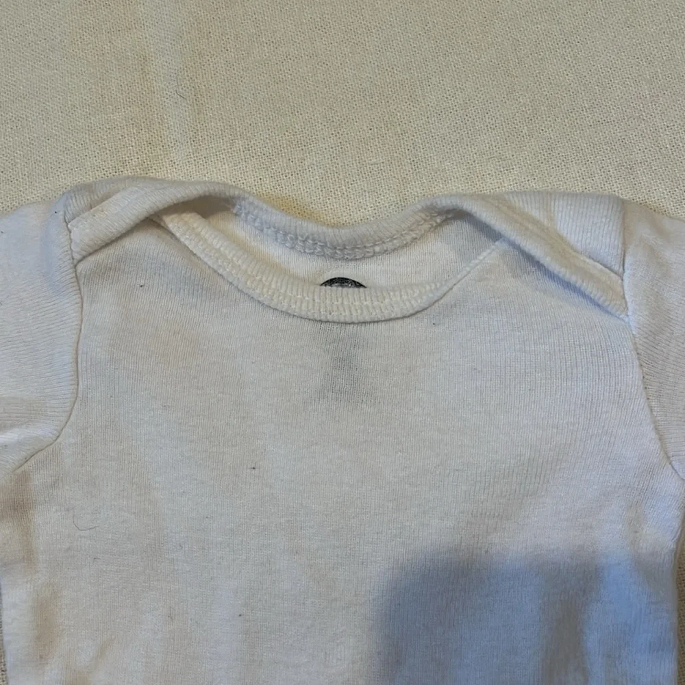 Assorted White Newborn Onesies